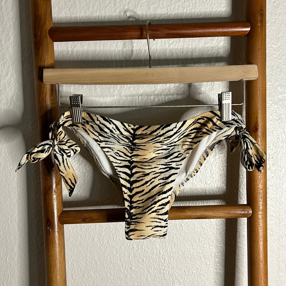 Large Victoria’s Secret buying suit bottoms tiger print, scrunch butt tie sides